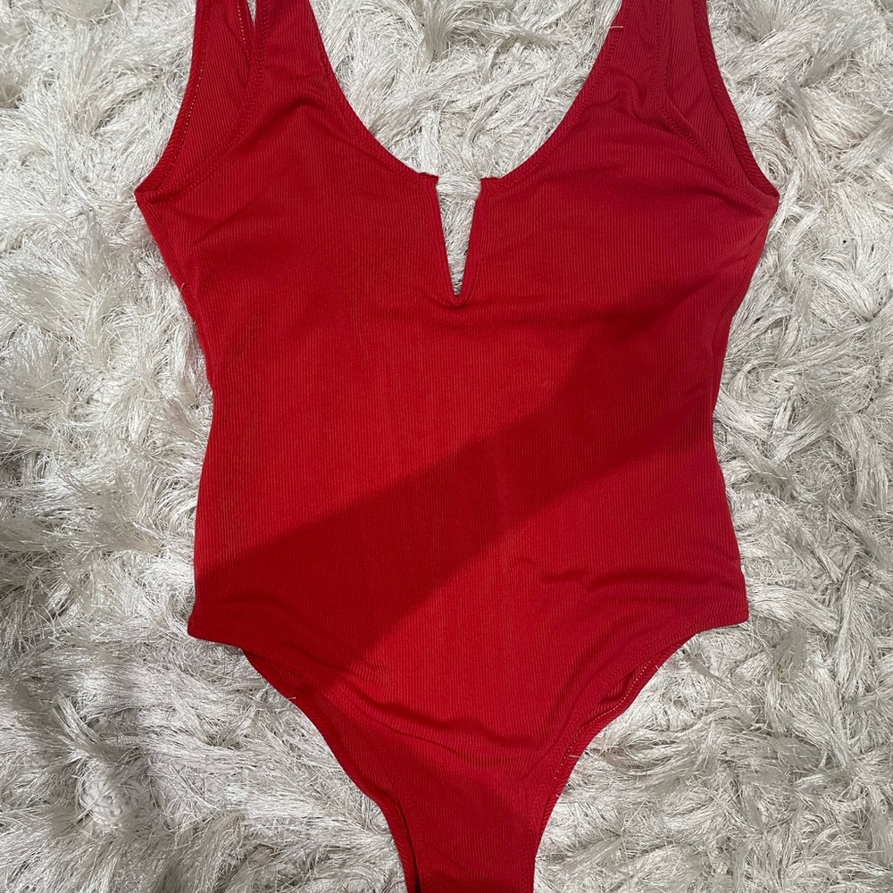 Red one piece swim size medium